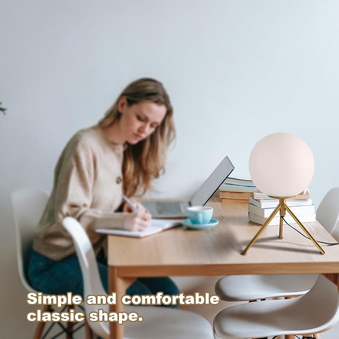 Mid century modern desk lamp with a golden base and white glass ball lampshade, suitable for 3 tone lighting in bedside bedrooms, living rooms, offices, libraries, and study rooms