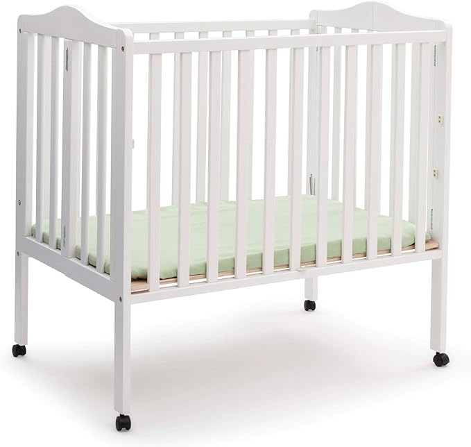 Delta Children Folding Portable Mini Baby Crib with 1.5-inch Mattress - Greenguard Gold Certified, White & Dream On Me Holly 3” Fiber Portable, Greenguard Gold Certified, White