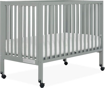 Quinn Full-Size Folding Crib in Cool Grey, Removeable Wheels, Modern Nursey, Adjustable Mattress Support, Portable Crib, Patented Folding System