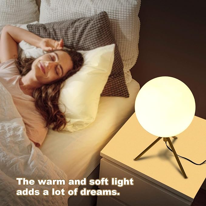 Mid century modern desk lamp with a golden base and white glass ball lampshade, suitable for 3 tone lighting in bedside bedrooms, living rooms, offices, libraries, and study rooms